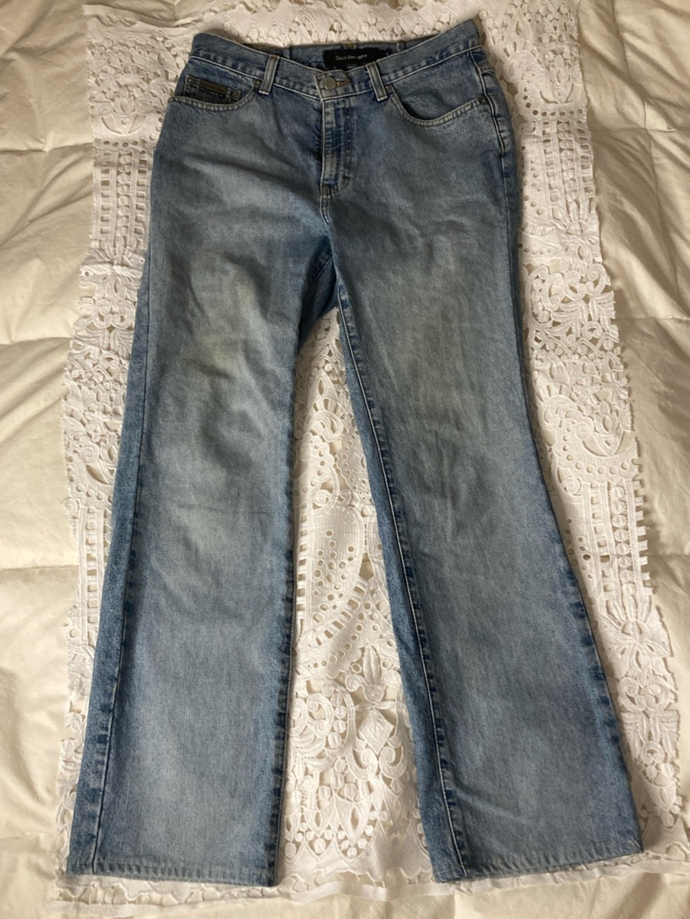 Calvin Klein Jeans High waisted light blue bootcut size 8 (measurements in pics)